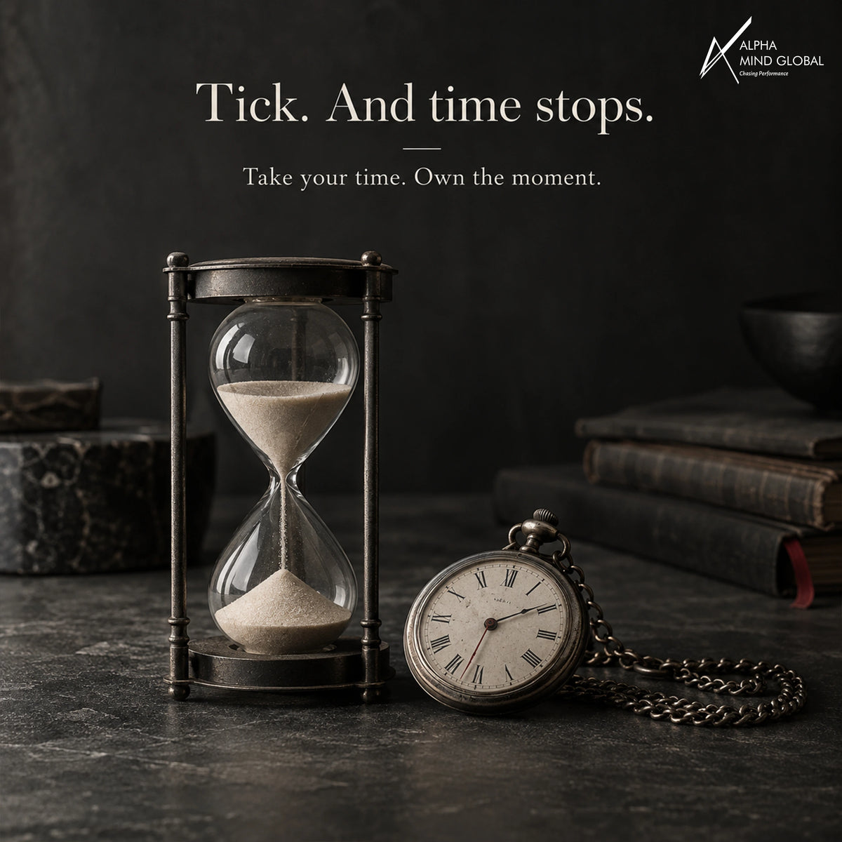 Golden hourglass with sand mid-fall beside a pocket watch: Alpha Delaaay, take your time, own the moment